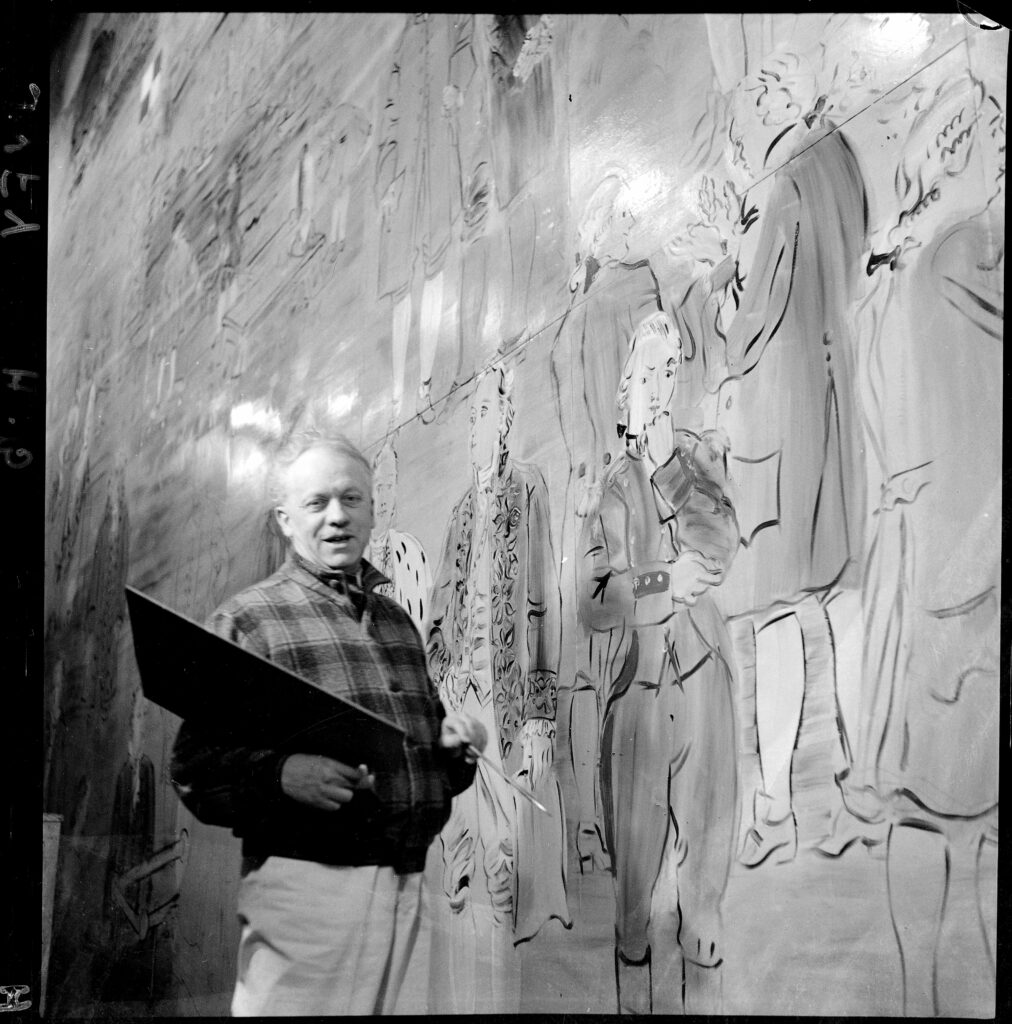 Photographie de Raoul Dufy exécutant un grand panneau décoratif sur l'électricité.